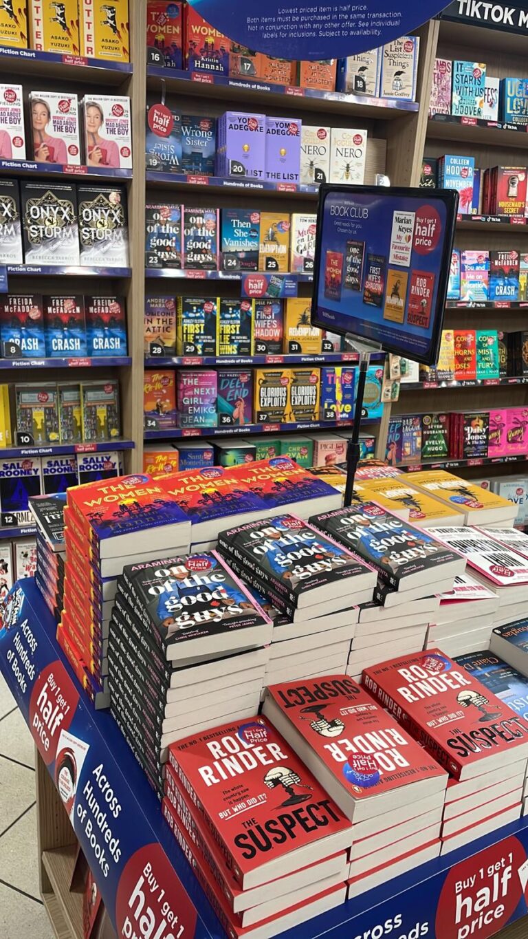 Display of books in a book store featuring One Of The Good Guys by Araminta Hall in the front of the image